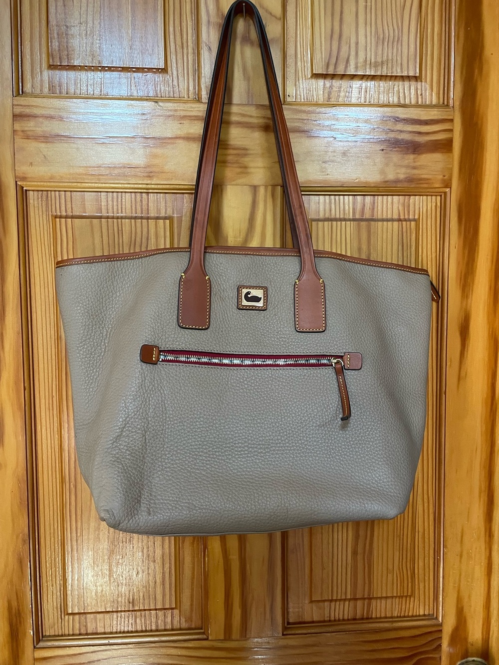 Gently used. Dooney & Bourke Gray Pebble Leather Tote with Brown Trim